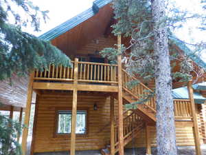 View of home's exterior with a balcony