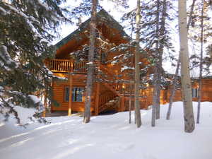 View of snow covered property