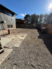 View of yard with a patio area