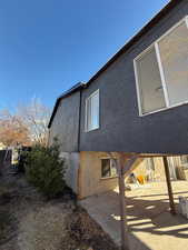 Back of property with a patio area