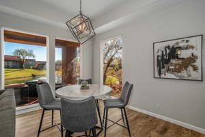 Dining area with views out of large windows.