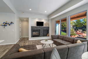 Living room with a stone fireplace and wonderful view