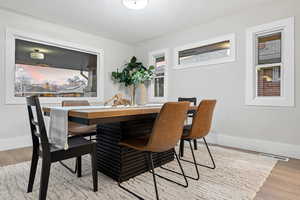 Dining space featuring light hardwood / wood-style floors