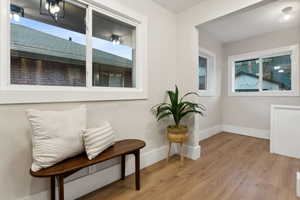 Living area featuring light hardwood / wood-style floors