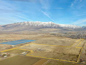 Birds eye view of property with a mountain view