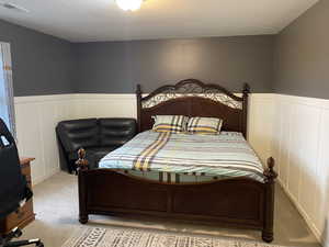 View of carpeted bedroom