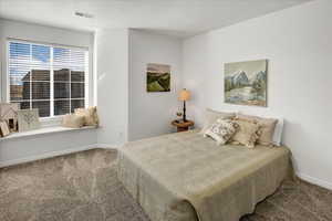 View of carpeted bedroom