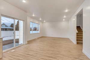 Spare room with light hardwood / wood-style floors