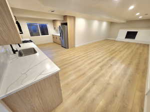 basement open-concept kitchen and family room