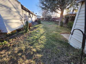 View of yard with central AC unit