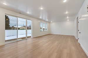 Unfurnished room featuring light wood-type flooring