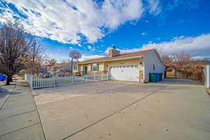 View of front of property with a garage