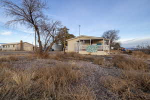 View of front of house featuring covered porch