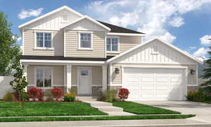Craftsman house featuring a garage and a front lawn
