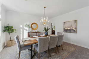 Freshly carpeted and painted formal dining area