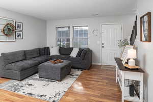 Living room featuring hardwood / wood-style flooring