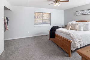 Bedroom with carpet floors and ceiling fan