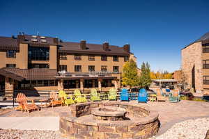 View of patio featuring a fire pit