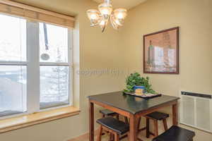 Dining area featuring a notable chandelier