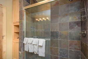 Bathroom with an enclosed shower