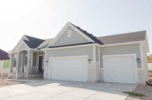 View of front of house with a garage