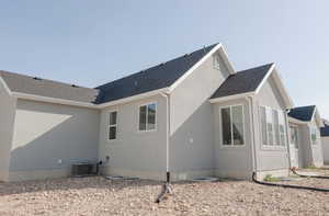 View of home's exterior with central air condition unit