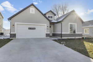 View of front facade with a garage