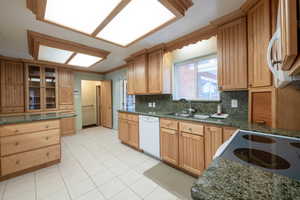 Kitchen with granite countertops and updated cabinetry