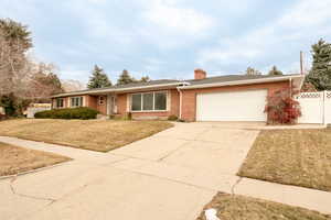 Brick rambler with 2 car garage