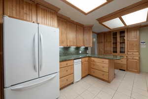 Kitchen with granite countertops and updated cabinetry