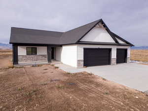 Ranch-style home with a garage