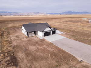 Bird's eye view featuring a mountain view and a rural view