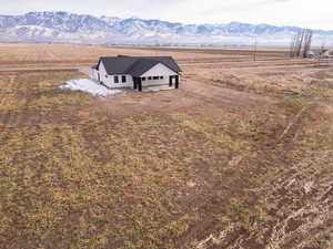 Drone / aerial view with a mountain view and a rural view