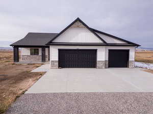 View of front of home featuring a garage