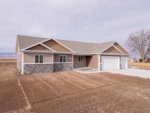 View of front of property featuring a garage