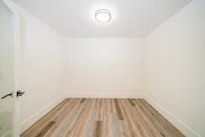 Spare room with light wood-type flooring