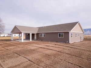 View of front of home with a patio area