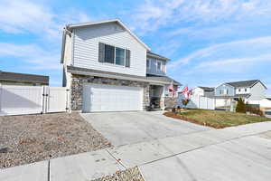 View of property featuring a garage