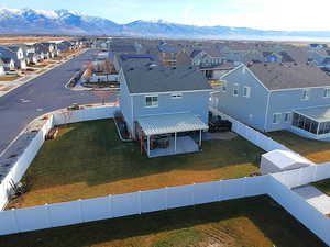 Birds eye view of property with a mountain view