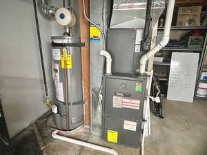 Utility room with gas water heater