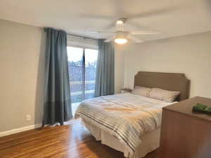 Bedroom featuring ceiling fan and hardwood / wood-style floors