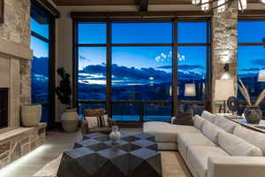 Living room featuring beamed ceiling and hardwood / wood-style flooring