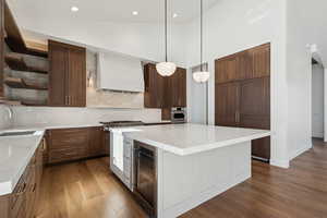 Kitchen featuring beverage/wine cooler,
