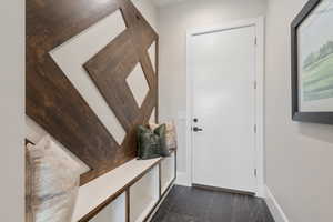 Interior space featuring dark tile patterned flooring