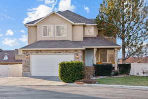 Front of property featuring a garage