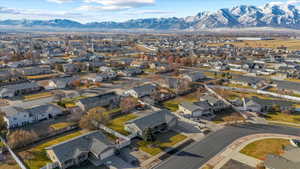 Birds eye view of property with a mountain view