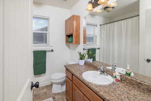 Bathroom with vanity and toilet