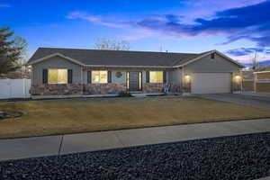 Ranch-style house featuring a garage