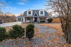 Cape cod-style house with a garage