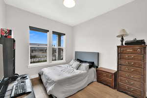 Bedroom with light wood-type flooring